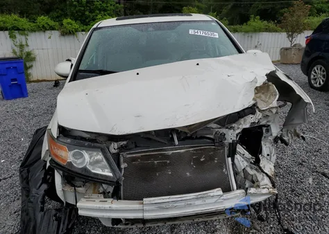 2015 Honda Odyssey Touring z USA, uszkodzony, nr VIN 5FNRL5H90FB057629